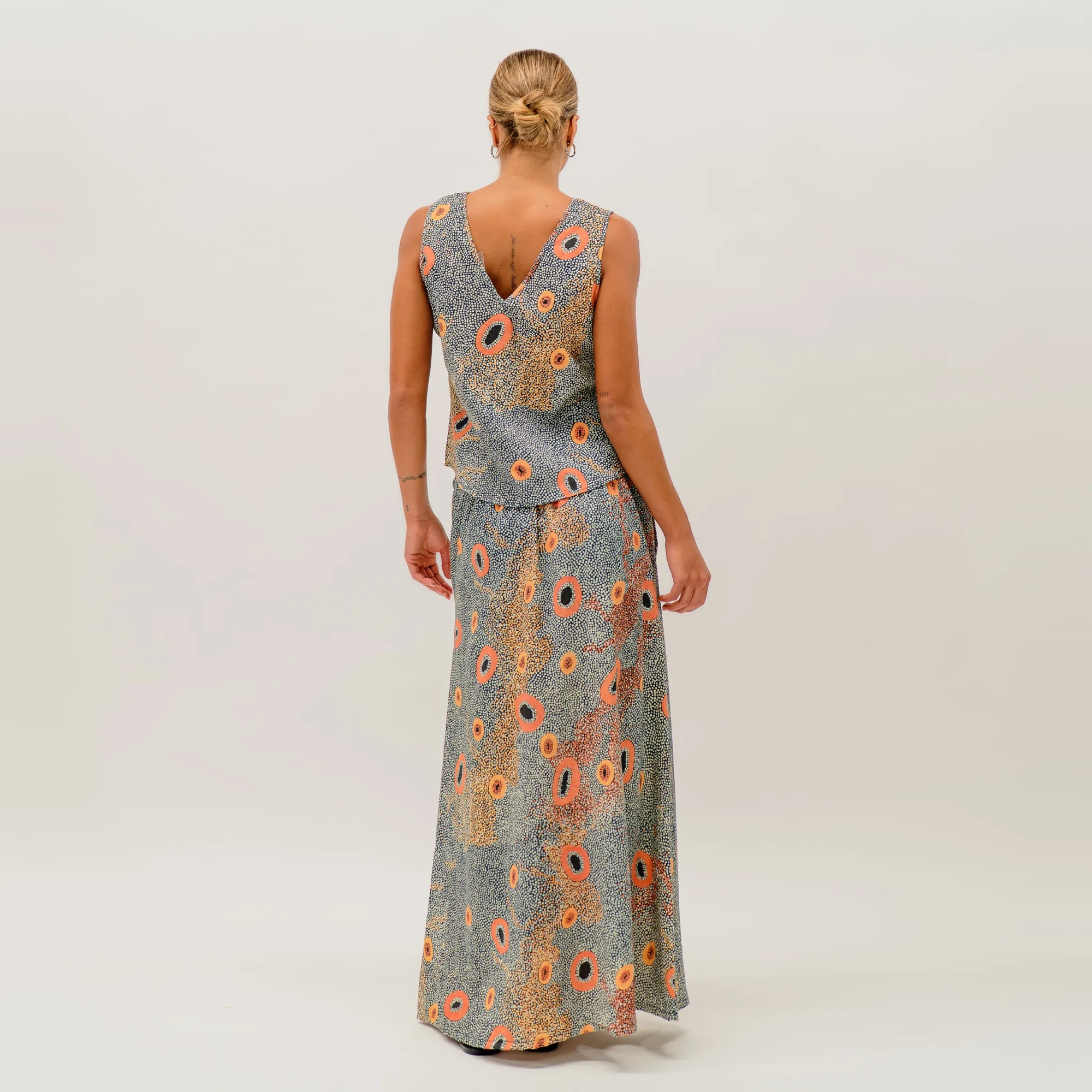 Dry Country skirt featuring exclusive artwork by Sheryl Hicks with earthy colours inspired by the Australian outback.