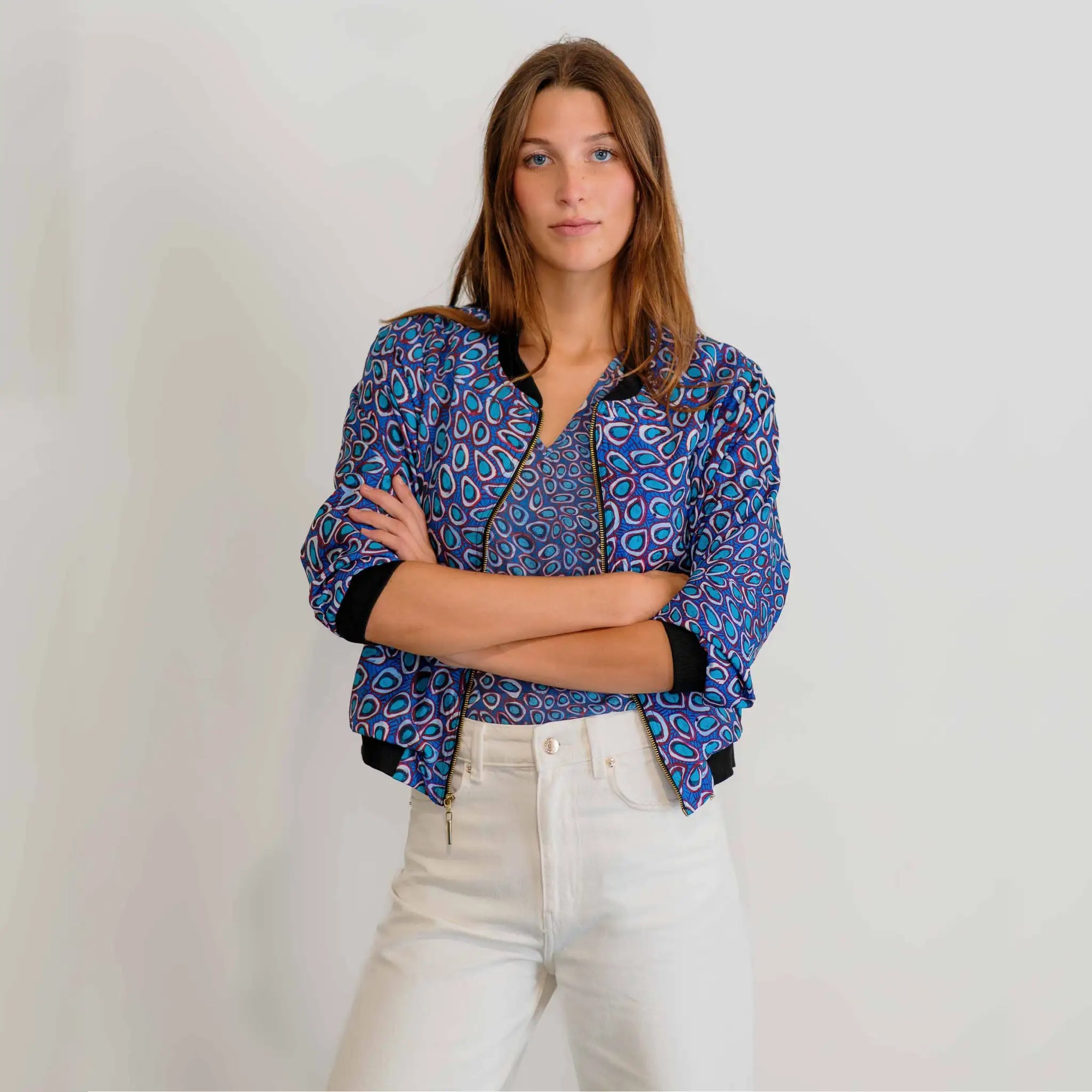 Pilbara Wildflowers Bomber Jacket showcasing colourful botanical artwork inspired by Western Australia's native flora.